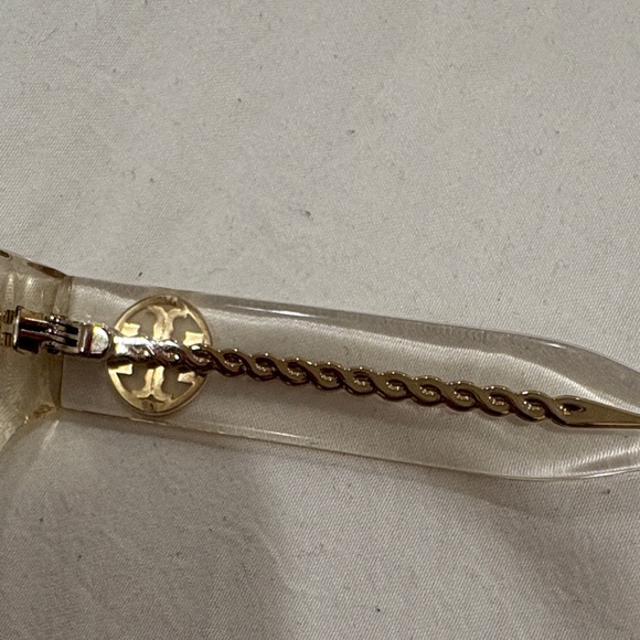 Tory Burch Clear Frame Sunglasses with Light Blue Lenses and Gold Chain Temples - Picture 4 of 7